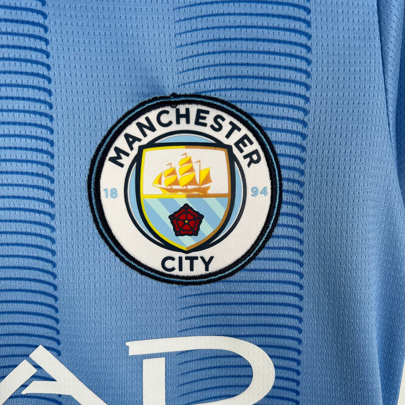 CAMISOLA MANCHESTER CITY I 23/24 mulher