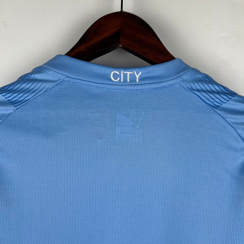 CAMISOLA MANCHESTER CITY I 23/24 mulher